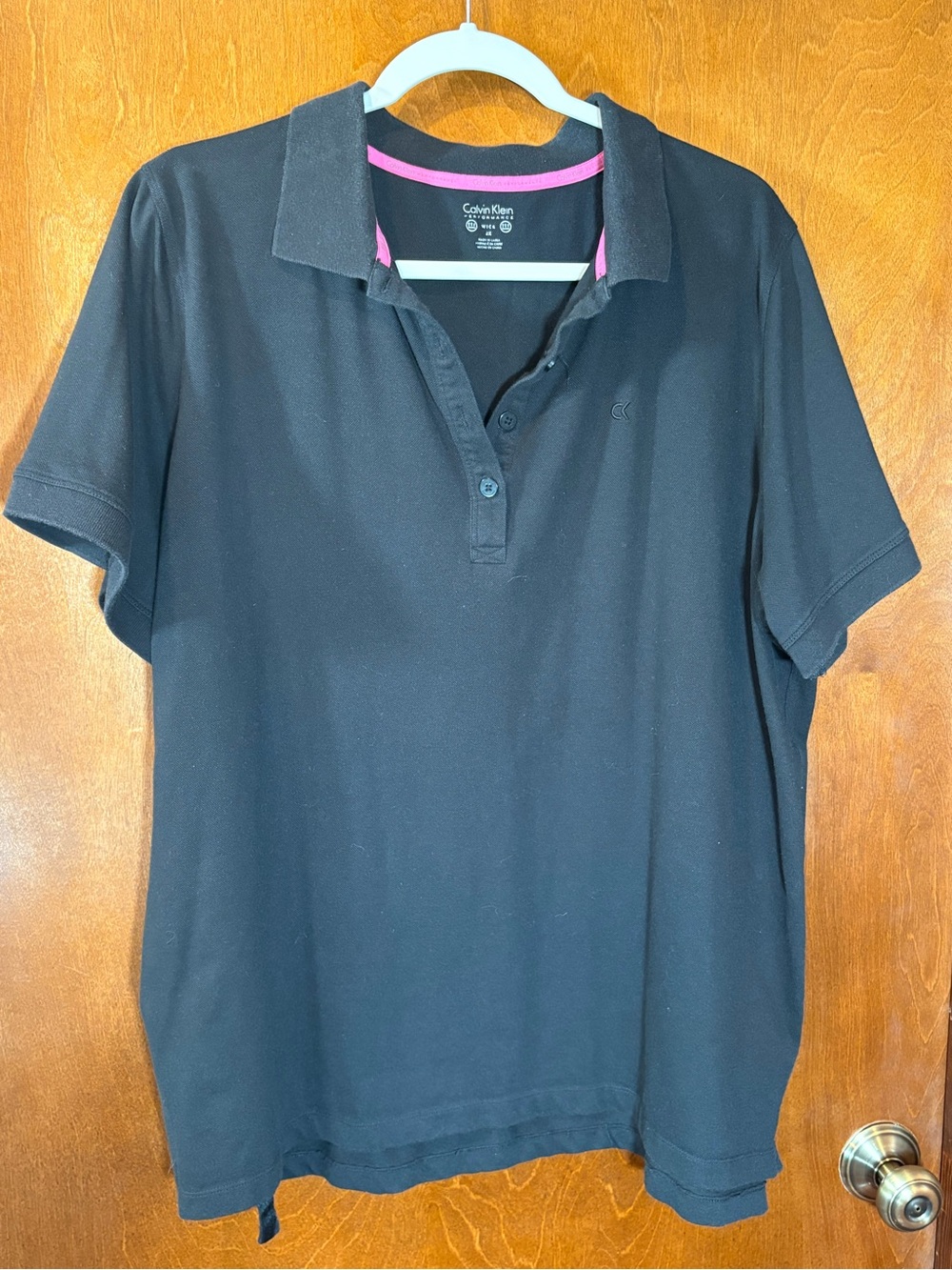 Calvin Klein Black Polo Top with Pink Neck Tape